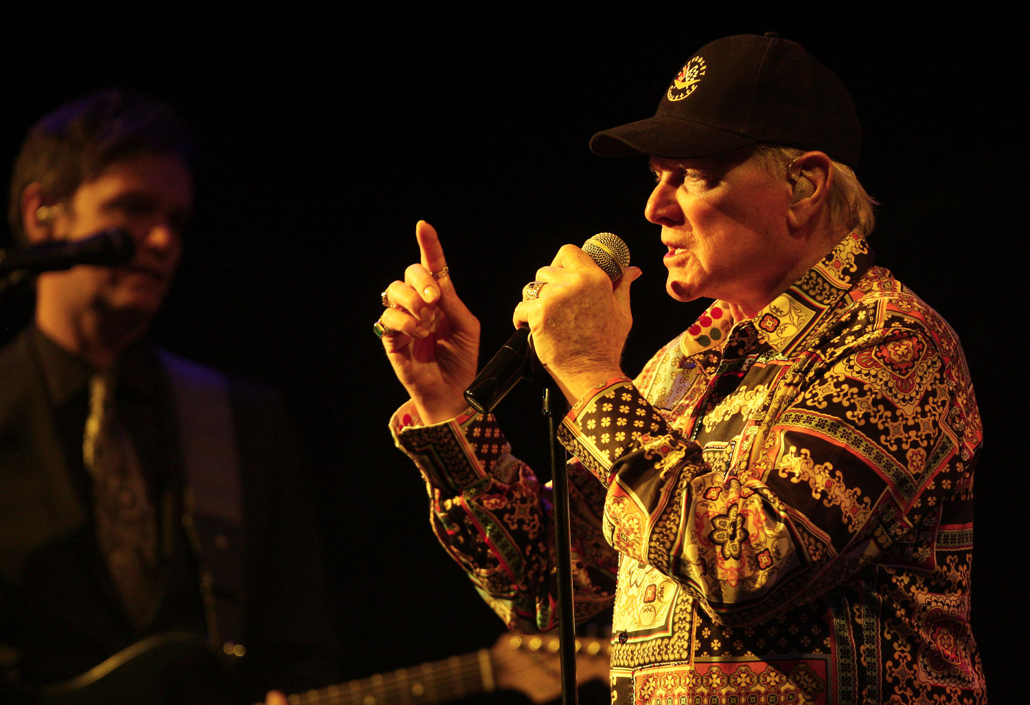 Original band member Mike Love (right) and The Beach Boys perform at the Mississippi Moon Bar inside Diamond Jo Casino on Saturday.    PHOTO CREDIT: Nicki Kohl