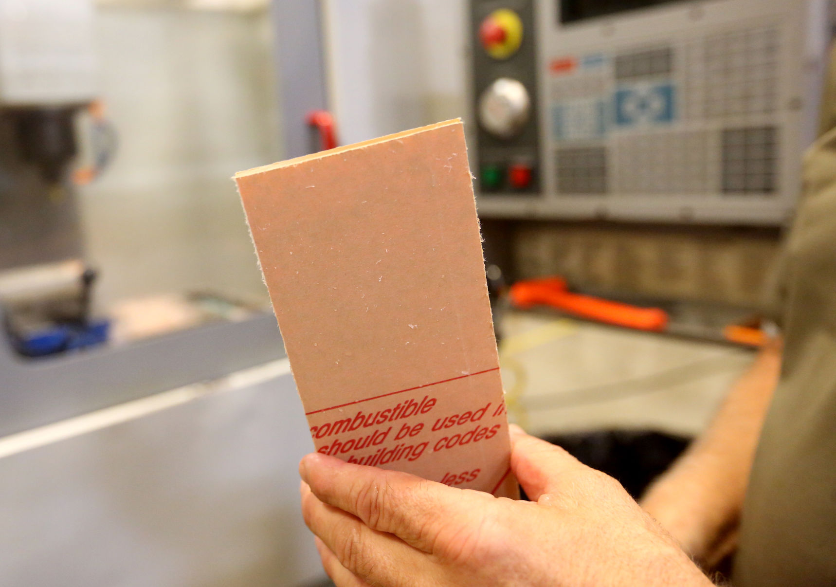 A piece of acrylic shelf before it is cut at IBI Scientific in Peosta, Iowa. PHOTO CREDIT: JESSICA REILLY