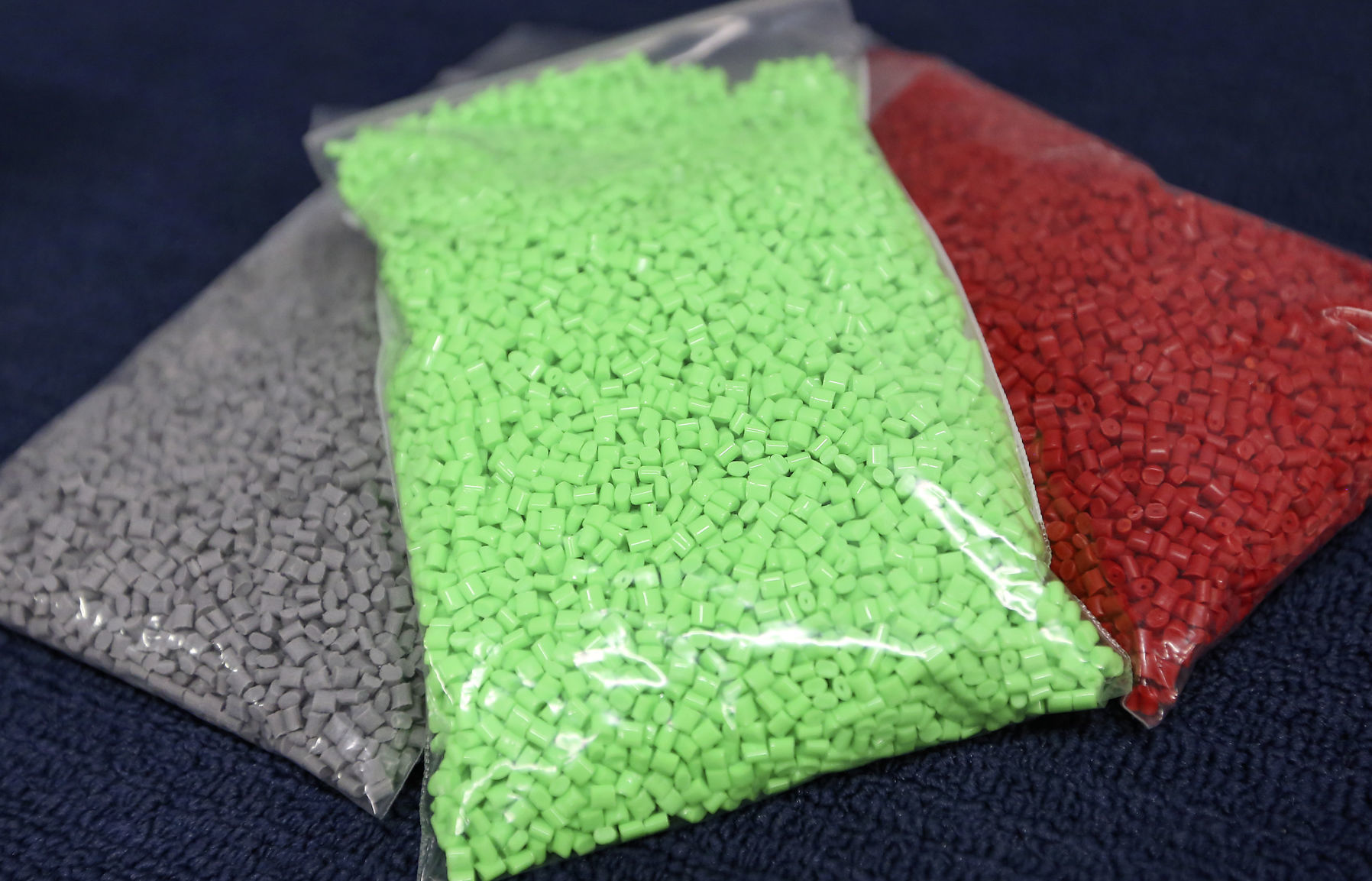 Finished plastic pellets in a variety of colors at JEDA Polymers in Dyersville, Iowa, on Monday, July 30, 2018.    PHOTO CREDIT: NICKI KOHL