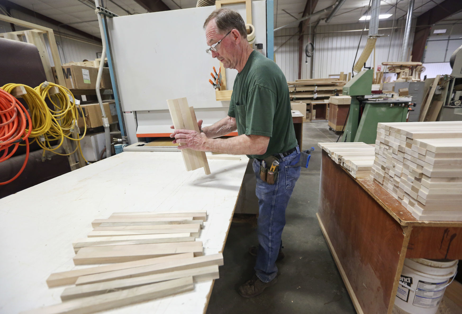 Ken Willenborg works at Heritage Wood Products in Worthington, Iowa, on Thursday, May 16, 2019.    PHOTO CREDIT: NICKI KOHL
