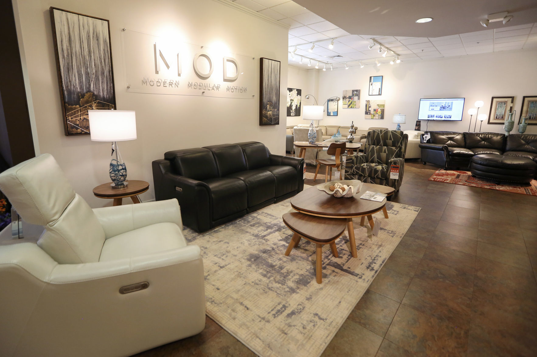 A new furniture gallery at FloorShow Furniture & Flooring in Dubuque on Friday, Oct. 4, 2019. FloorShow will have a branding change on Monday, when the company will officially become known as Home + Floor Show. PHOTO CREDIT: NICKI KOHL