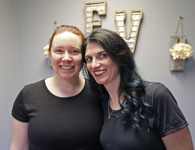 The wwners of EVolve Day Spa in Dubuque are Chelsea Vollmer (left) and Lindsey Einsweiler. PHOTO CREDIT: Dave Kettering