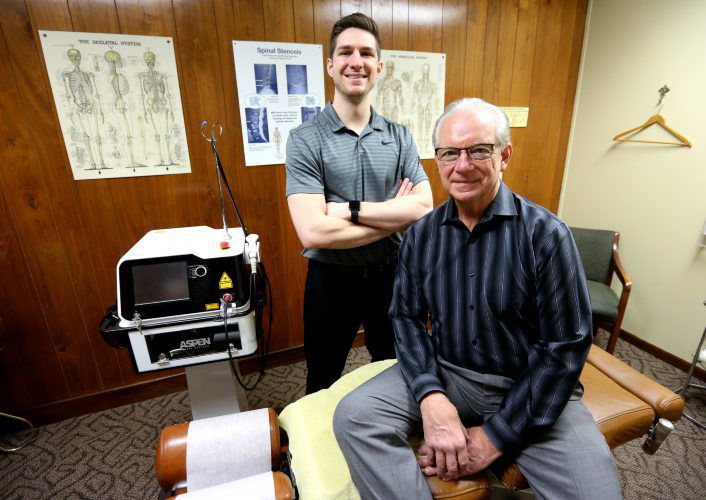 Eric Effertz (left), owner of Effertz Chiropractic and Wellness in East Dubuque, Ill., has taken over the longtime East Dubuque business owned by David Weber, who will be retiring after 42 years in practice. PHOTO CREDIT: Dave Kettering