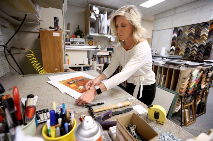 Michele Hefel owns A Frame of Mind Framing & Gallery in Dubuque. PHOTO CREDIT: JESSICA REILLY