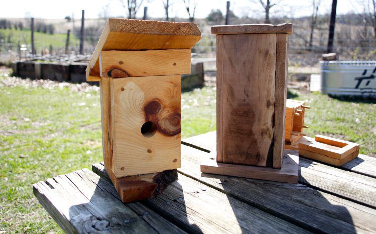 Mark Harting, of H&H Ranch, makes birdhouses to sell. Each birdhouse is unique because Mark tries to leave the wood as natural as possible.    PHOTO CREDIT: EILEEN MESLAR