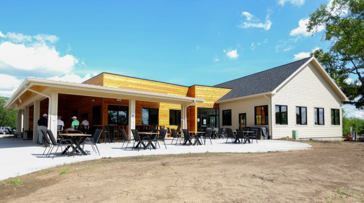 The new clubhouse at Lacoma Golf Club in East Dubuque, Ill., offers an outdoor patio as one of its new features. PHOTO CREDIT: Dave Kettering