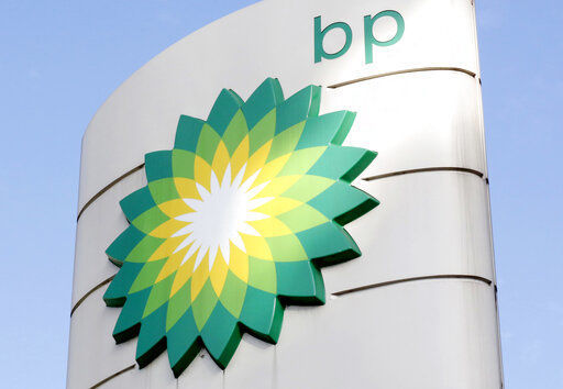 FILE - This Tuesday, Aug. 1, 2017 file photo shows the BP logo at a petrol station in London. Energy company BP is writing off as much as $17.5 billion from its oil and gas assets and will review its plans to develop oil wells as the COVID-19 pandemic accelerates its goal of decreasing its reliance on fossil fuels. (AP Photo/Caroline Spiezio, File) PHOTO CREDIT: Caroline Spiezio