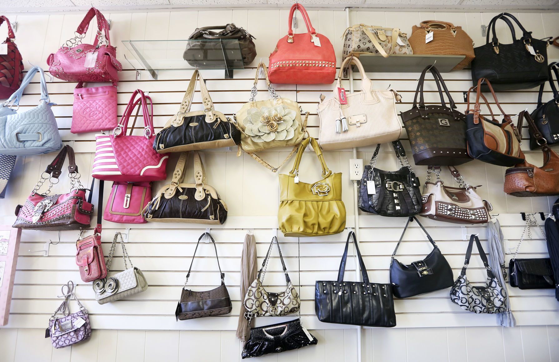 Purses for sale at The Jewelry Box in Dubuque on Thursday, June 25, 2020. PHOTO CREDIT: NICKI KOHL