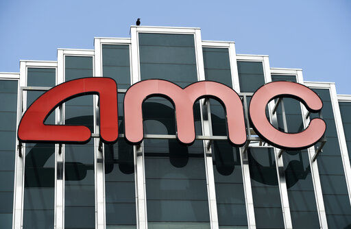 FILE - In this April 29, 2020 file photo, the AMC sign appears at AMC Burbank 16 movie theater complex in Burbank, Calif. AMC Theaters, the nation’s largest chain, is pushing back its plans to begin reopening theaters by two weeks. The company said Monday that it would open approximately 450 U.S. locations on July 30 and the remaining 150 the following week. (AP Photo/Chris Pizzello, File) PHOTO CREDIT: Associated Press file