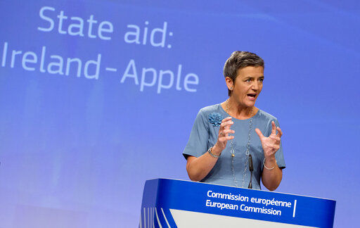 European Union Competition Commissioner Margrethe Vestager speaks during a media conference at EU headquarters in Brussels. A European Union high court today ruled in favor of technology giant Apple and Ireland in its dispute with the EU over 13 billion euros in back taxes. PHOTO CREDIT: Virginia Mayo