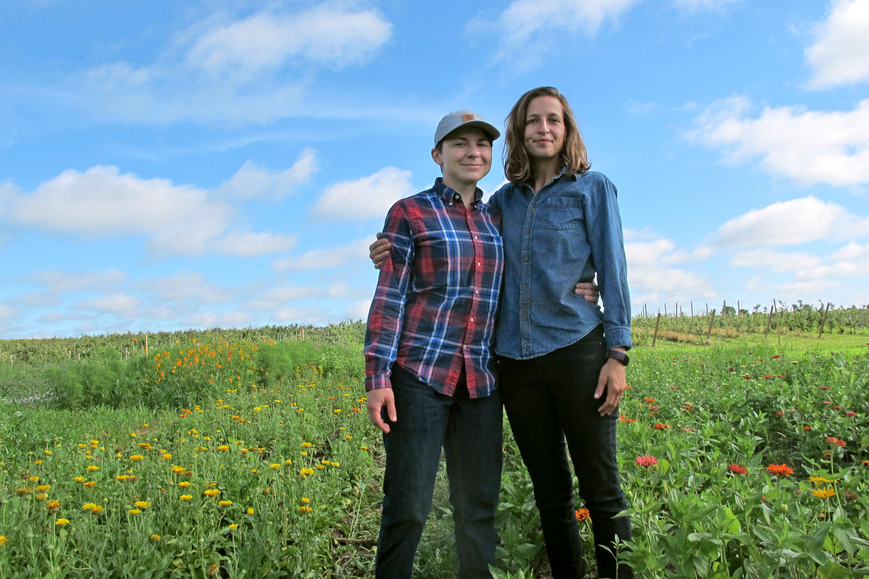 Shae Pesek (left) and Anna Hankins operate Over the Moon Farm & Flowers in Ryan, Iowa. PHOTO CREDIT: Contributed
