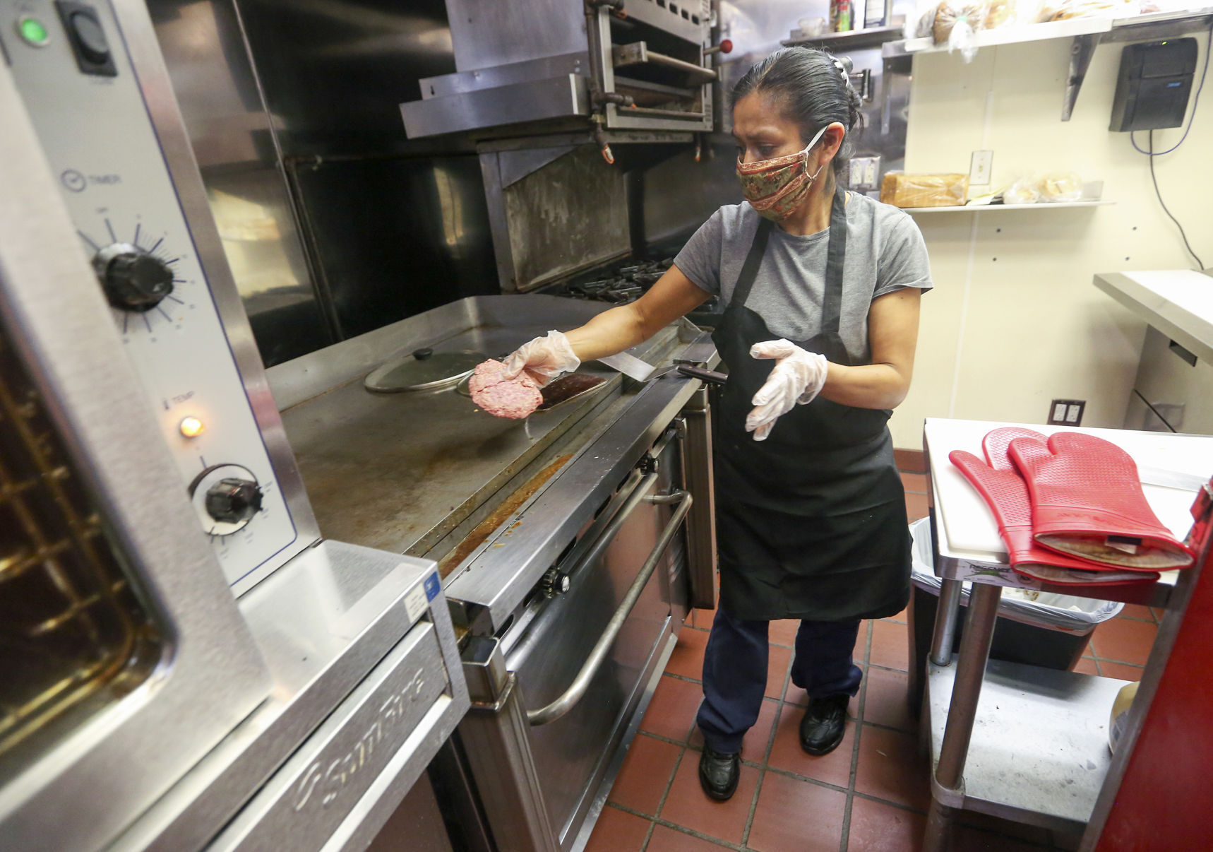 Celia Berez prepares food at Frentress Lake Bar & Grill in East Dubuque, Ill., on Thursday, July 16, 2020. PHOTO CREDIT: NICKI KOHL