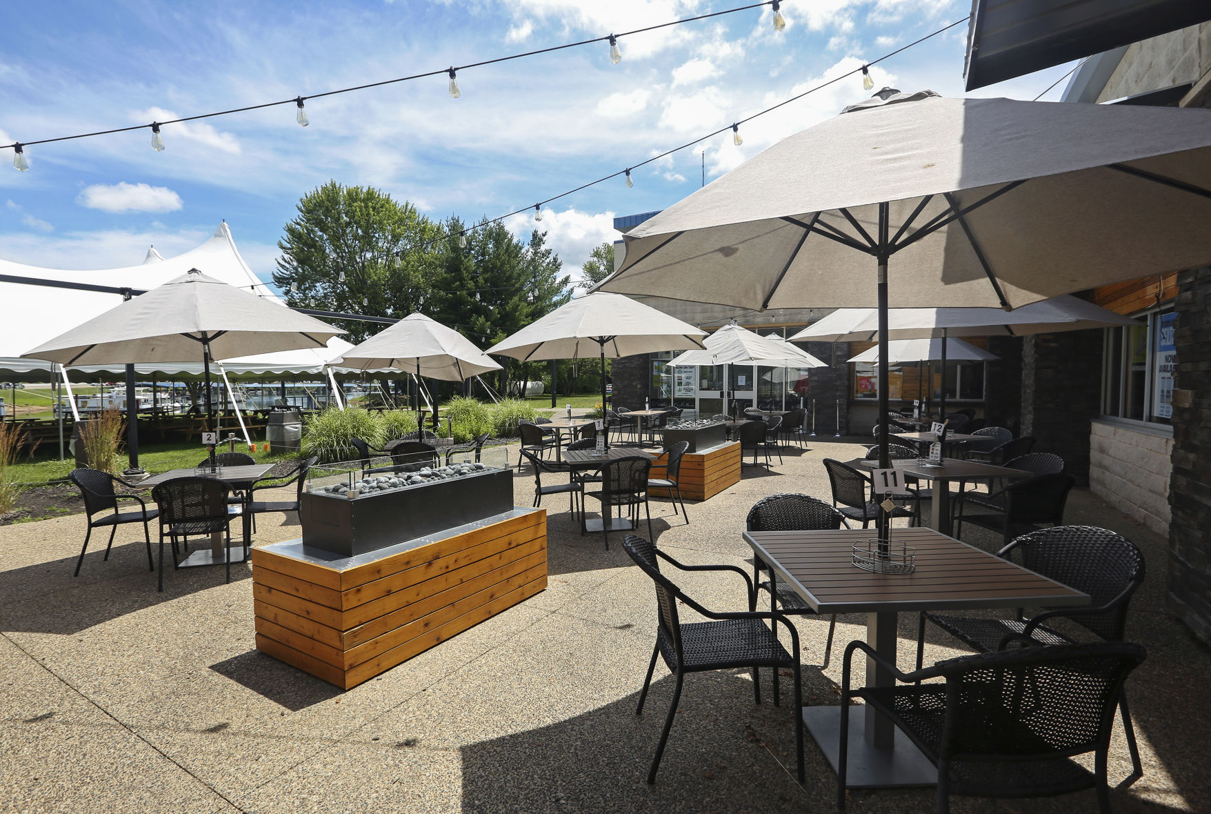 Outdoor seating at Frentress Lake Bar & Grill in East Dubuque, Ill., on Thursday, July 16, 2020. PHOTO CREDIT: NICKI KOHL