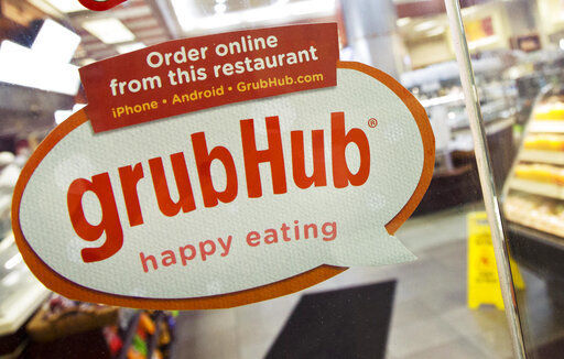 Grubhub saw its average daily orders jump 32% in the second quarter today, but swung to a loss as it spent heavily to prop up restaurants and protect drivers. PHOTO CREDIT: The Associated Press