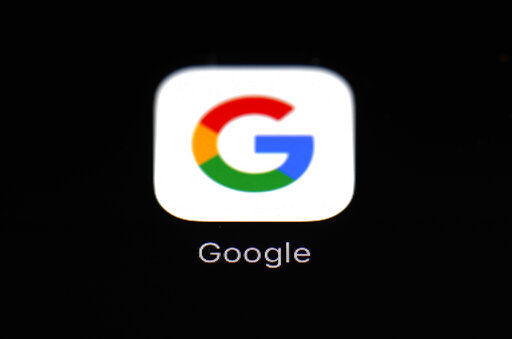 FILE - This March 19, 2018 photo shows the Google app on an iPad in Baltimore. Big Tech companies reported mixed quarterly earnings on Thursday, July 30, 2020, a day after their top executives faced a tough congressional grilling over their market power and alleged monopolistic practices. (AP Photo/Patrick Semansky, File) PHOTO CREDIT: Patrick Semansky