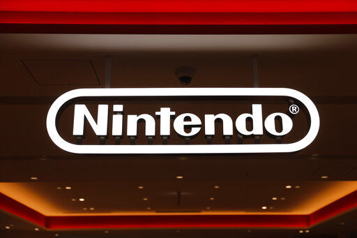 Japanese video-game maker Nintendo Co. has scored a 33% jump in annual profit as people stuck at home during the coronavirus pandemic turn to playing games. PHOTO CREDIT: Jae C. Hong