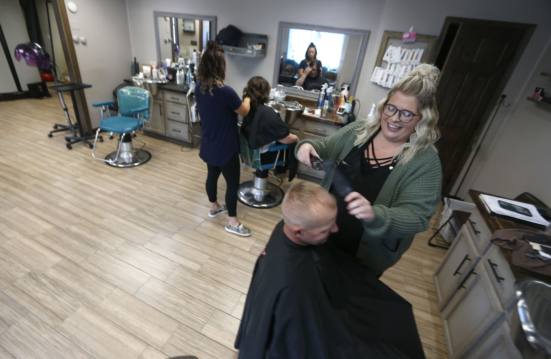 Amanda Whitt, is the owner of Midwest Roots Salon in East Dubuque, Ill., which also expanded. PHOTO CREDIT: Dave Kettering