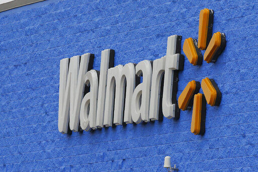 Signage is pictured at a Walmart store Tuesday, Aug. 4, 2020, in Oklahoma City. Walmart delivered strong profits and sales that beat Wall Street expectations for its fiscal second quarter helped by shoppers focused on buying food and other items as they stay close to home during the pandemic. (AP Photo/Sue Ogrocki) PHOTO CREDIT: Sue Ogrocki