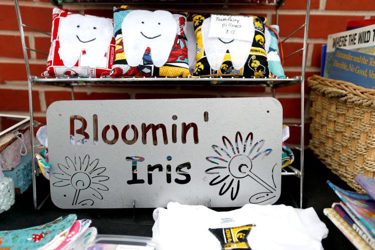 Products of the Bloomin’ Iris at farmers market in Dubuque. PHOTO CREDIT: Dave Kettering