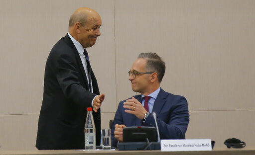 French Foreign Minister Jean-Yves Le Drian left, and German Foreign Minister Heiko Maas attend the opening session of the French ambassadors to European countries in Paris, Monday, Aug. 31, 2020. (AP Photo/Michel Euler) PHOTO CREDIT: Michel Euler