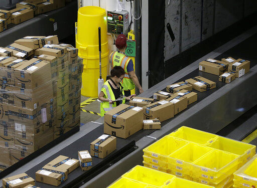Amazon said today that it will be hiring another 100,000 people to keep up with a surge of online orders. The company said the new hires will help pack, ship or sort orders, working in part-time and full-time roles. Amazon said the jobs are not related to its typical holiday hiring. PHOTO CREDIT: Rich Pedroncelli