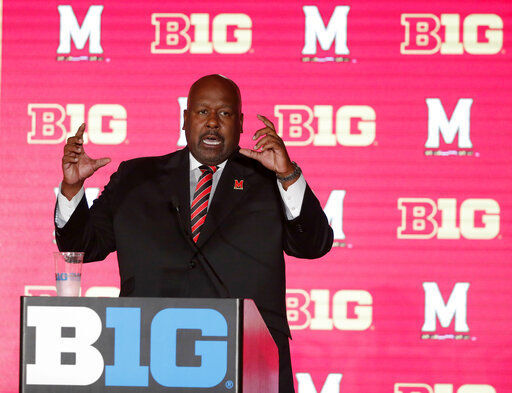 FILE p- In this July 18, 2019, file photo, Maryland head coach Mark Locksley responds to a question during the Big Ten Conference NCAA college football media days in Chicago. Big Ten is going to give fall football a shot after all. Less than five weeks after pushing football and other fall sports to spring in the name of player safety during the pandemic, the conference changed course Wednesday, Sept. 16, 2020, and said it plans to begin its season the weekend of Oct. 23-24.(AP Photo/Charles Rex Arbogast, File) PHOTO CREDIT: Charles Rex Arbogast
