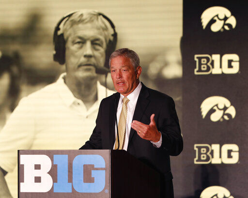 FILE - In this July 19, 2019, file photo, Iowa head coach Kirk Ferentz responds to a question during the Big Ten Conference NCAA college football media days in Chicago. Big Ten is going to give fall football a shot after all. Less than five weeks after pushing football and other fall sports to spring in the name of player safety during the pandemic, the conference changed course Wednesday, Sept. 16, 2020, and said it plans to begin its season the weekend of Oct. 23-24.(AP Photo/Charles Rex Arbogast, File) PHOTO CREDIT: Charles Rex Arbogast
