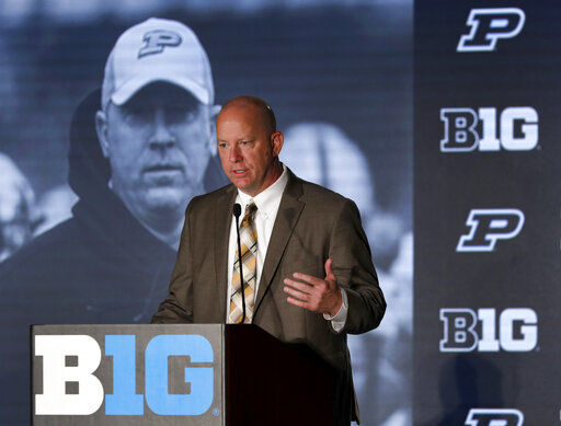 FILE - In this July 19, 2019, file photo, Purdue head coach Jeff Brohm responds to a question during the Big Ten Conference NCAA college football media days in Chicago. Big Ten is going to give fall football a shot after all. Less than five weeks after pushing football and other fall sports to spring in the name of player safety during the pandemic, the conference changed course Wednesday, Sept. 16, 2020, and said it plans to begin its season the weekend of Oct. 23-24.(AP Photo/Charles Rex Arbogast, File) PHOTO CREDIT: Charles Rex Arbogast
