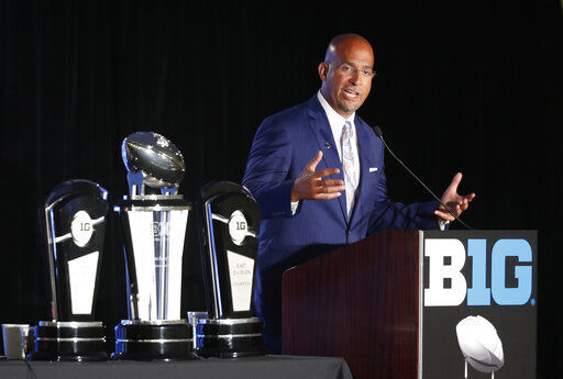 FILE - In this July 19, 2019, file photo, Penn State head coach James Franklin responds to a question during the Big Ten Conference NCAA college football media days, in Chicago. Big Ten is going to give fall football a shot after all. Less than five weeks after pushing football and other fall sports to spring in the name of player safety during the pandemic, the conference changed course Wednesday, Sept. 16, 2020, and said it plans to begin its season the weekend of Oct. 23-24.(AP Photo/Charles Rex Arbogast, File) PHOTO CREDIT: Charles Rex Arbogast