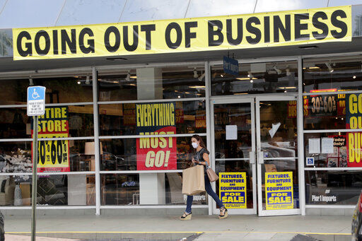 FILE - In this Aug. 6, 2020, file photo, a customer leaves a Pier 1 retail store, which is going out of business, during the coronavirus pandemic in Coral Gables, Fla. The Labor Department reported unemployment numbers Thursday, Sept. 3. (AP Photo/Lynne Sladky, File) PHOTO CREDIT: Lynne Sladky