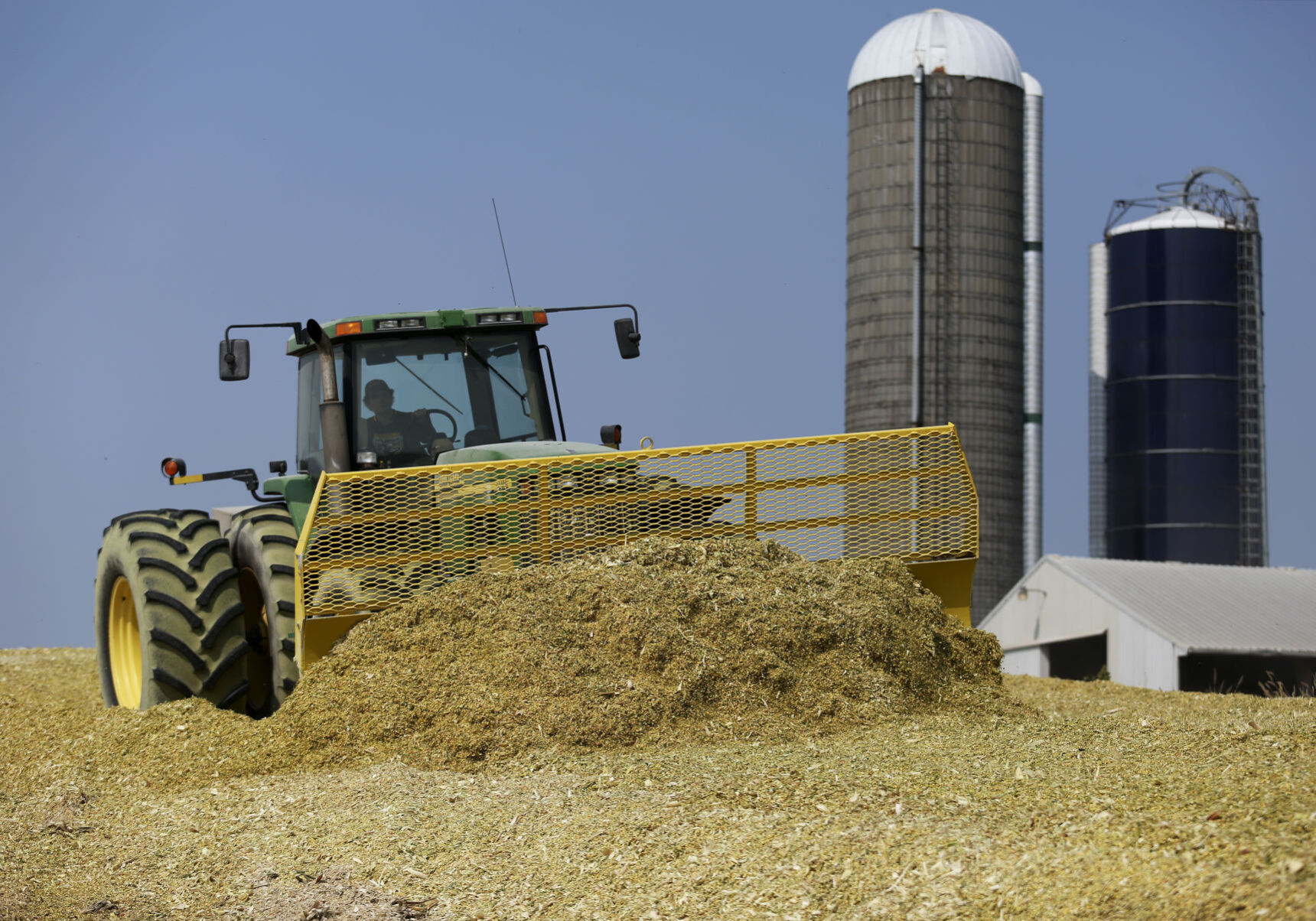 Andy Recker packs chopped earlage at the Recker farm. PHOTO CREDIT: NICKI KOHL