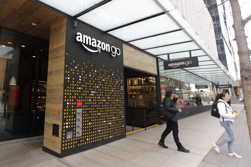 Amazon is rolling out a new device for contactless transactions that will scan an individual’s palm. The Amazon One, which will initially launch in two Amazon Go stores in Seattle, is being viewed as a way for people to use their palm to make everyday activities like paying at a store easier.  PHOTO CREDIT: Ted S. Warren