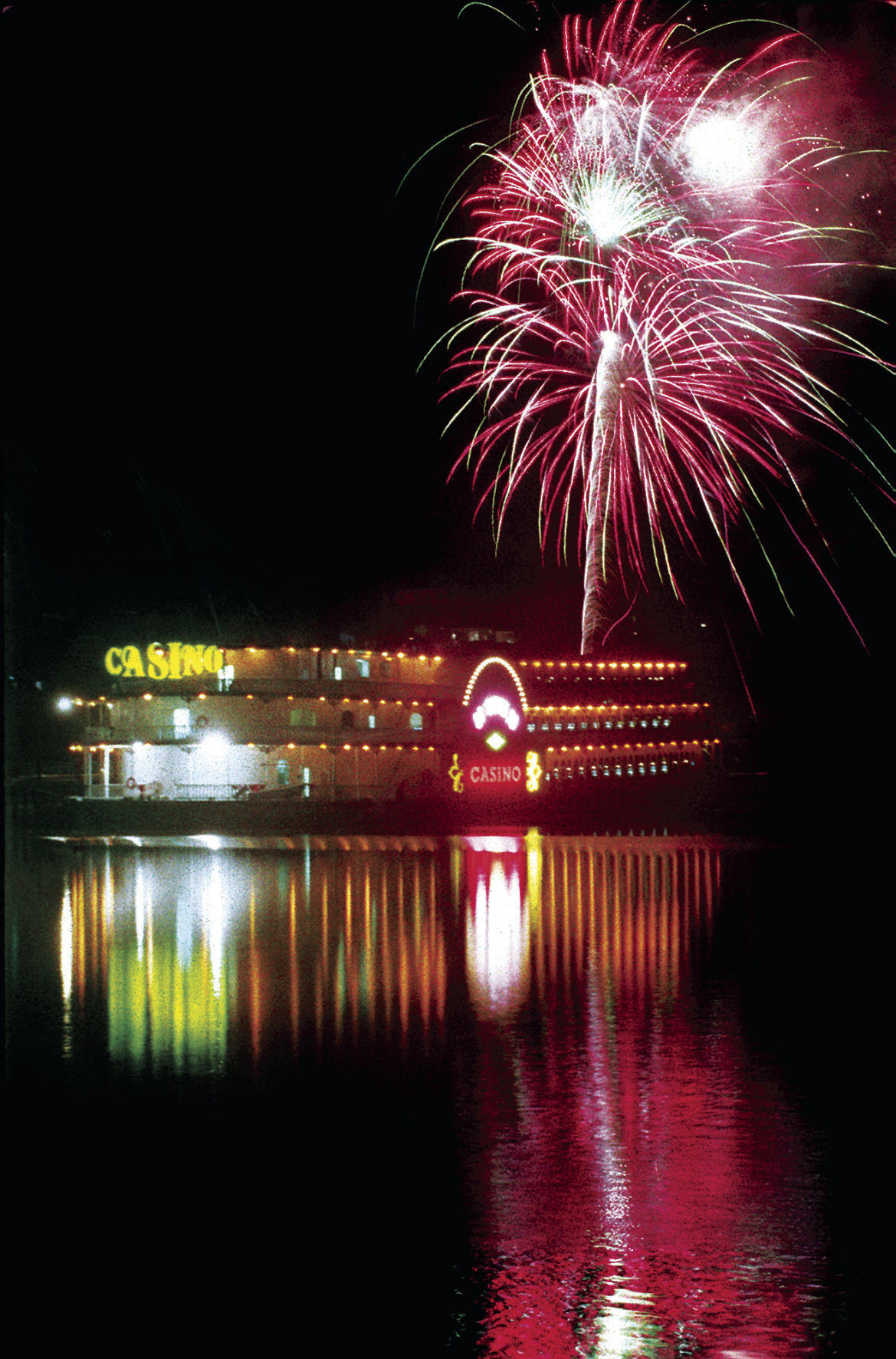Fireworks sparkle above the new Diamond Jo Casino in Dubuque’s Ice Harbor in 1995.    PHOTO CREDIT: Dave Kettering, Telegraph Herald file