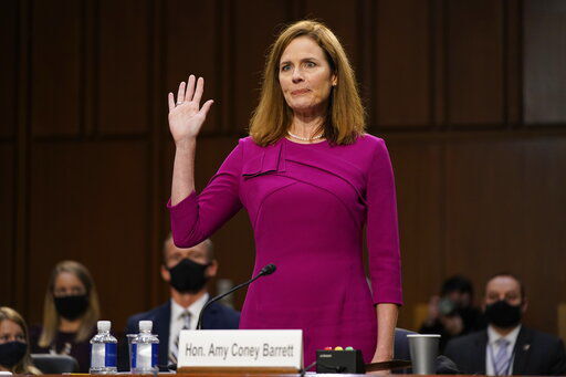 Supreme Court nominee Amy Coney Barrett is sworn in during a confirmation hearing before the Senate Judiciary Committee, Monday, Oct. 12, 2020, on Capitol Hill in Washington. (AP Photo/Patrick Semansky, Pool) PHOTO CREDIT: Patrick Semansky