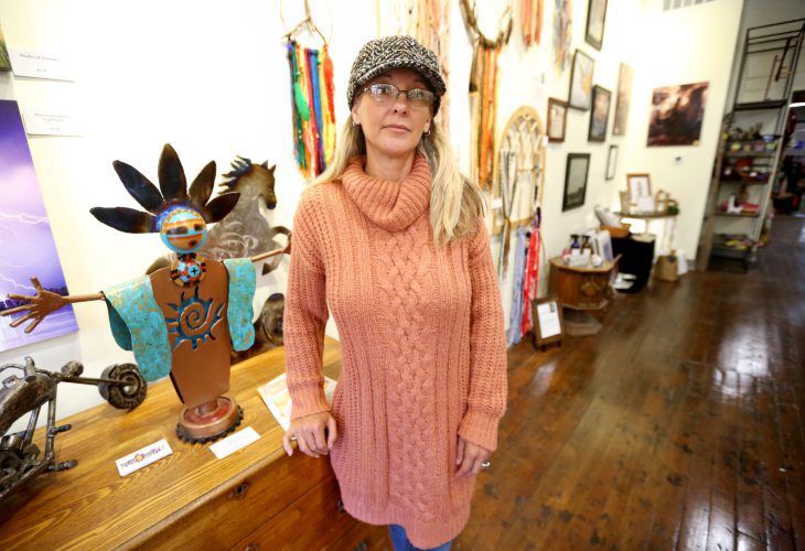Kristina Beytien, of Upcycle Dubuque, said the store will close on Dec. 12. She said the store’s sales are down two-third’s compared to last year because of the COVID-19 pandemic. PHOTO CREDIT: JESSICA REILLY
