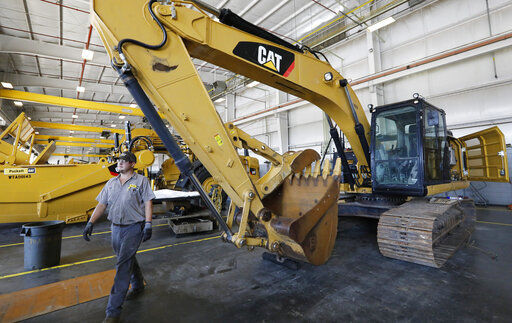 Caterpillar is reporting a third-quarter profit of $668 million and topped most expectations, though demand for its equipment is being driven down by the pandemic.  PHOTO CREDIT: Rogelio V. Solis