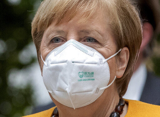 German Chancellor Angela Merkel arrives for a press conference in Berlin, Germany, Monday, Nov. 2, 2020. (AP Photo/Michael Sohn) PHOTO CREDIT: Michael Sohn