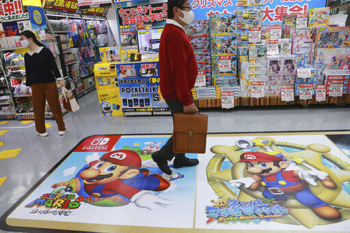 Nintendo, the Japanese company behind Super Mario and Pokemon video games, reported Thursday that its fiscal first half profit more than tripled as passed time while stuck at home during the pandemic playing games.  PHOTO CREDIT: Koji Sasahara