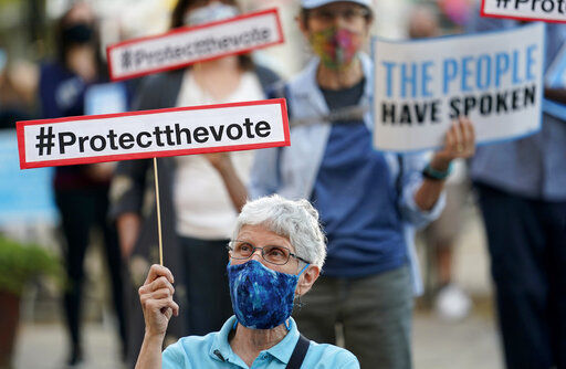 Protesters gather at a protect the vote rally in downtown San Antonio, Wednesday, Nov. 4, 2020. (AP Photo/Eric Gay) PHOTO CREDIT: Eric Gay