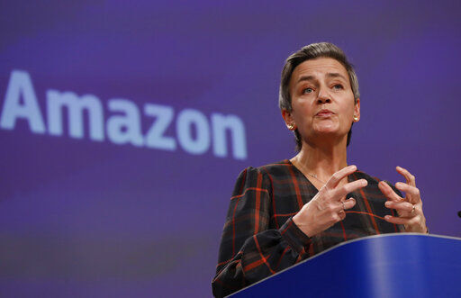 European Executive Vice-President Margrethe Vestager speaks during a press conference regarding an antitrust case with Amazon at EU headquarters in Brussels. European Union regulators have filed antitrust charges against Amazon, accusing the e-commerce giant of using data to gain an unfair advantage over merchants using its platform. PHOTO CREDIT: Olivier Hoslet