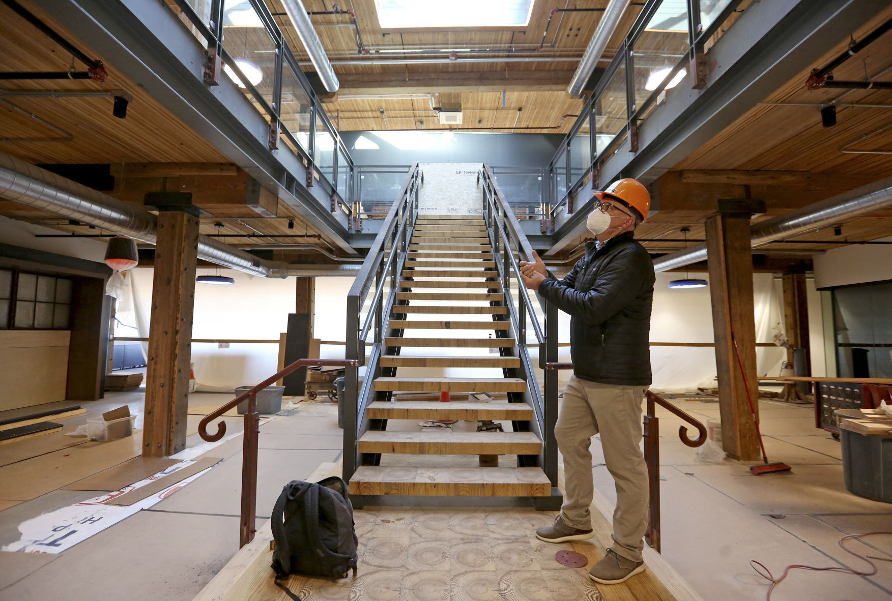 David Klavitter, Dupaco Community Credit Union’s chief marketing officer, shows off new office space at the Dupaco Voices building in Dubuque’s Millwork District. Dupaco has made a $37 million investment in renovating the structure. PHOTO CREDIT: JESSICA REILLY