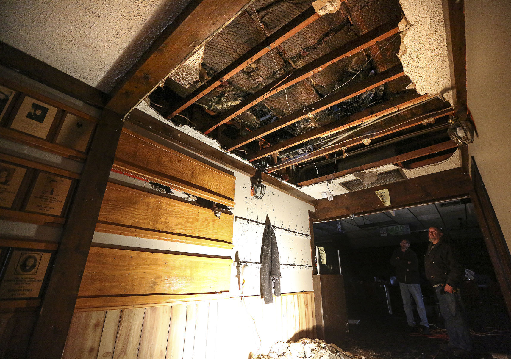 Damage from fire can be seen on the ceiling of Pioneer Lanes Bar, Grill & Banquet Center in Platteville, Wis., on Sunday. PHOTO CREDIT: Dave Kettering