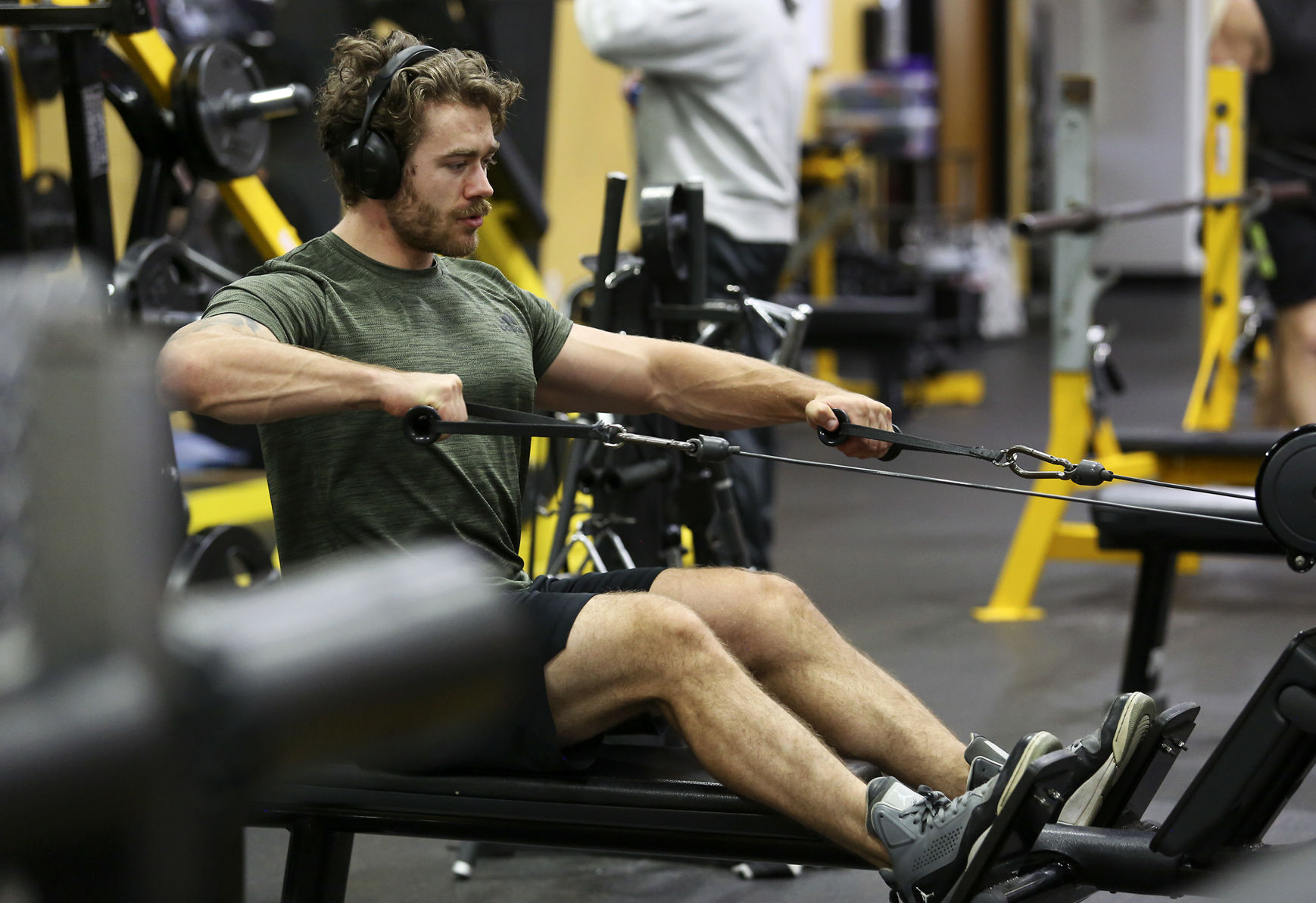 Colten Weinberger, of Dubuque, exercises at Signature Health & Fitness in Dubuque on Friday, Nov. 20, 2020. PHOTO CREDIT: NICKI KOHL