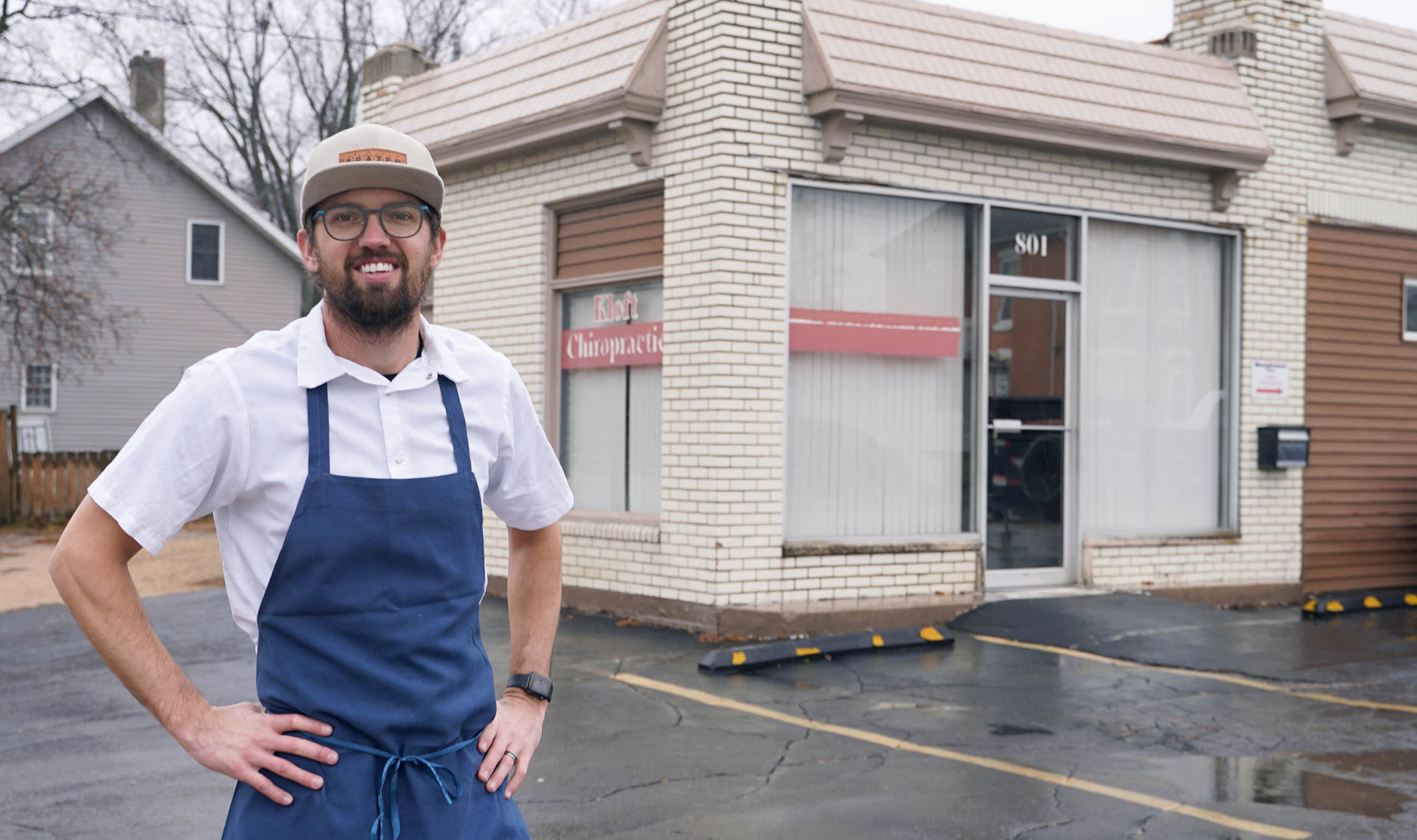 Kevin Scharpf, the chef and owner of Brazen Open Kitchen + Bar in Dubuque, stands in front of 801 Rhomberg Ave. in Dubuque, where he plans to open a new restaurant. PHOTO CREDIT: PAUL KURUTSIDES