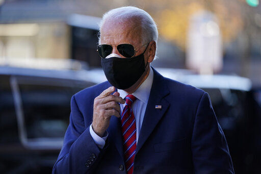 FILE - In this Nov. 23, 2020, file photo President-elect Joe Biden walks from his motorcade to speak to members of the media in Wilmington, Del. The big tech companies enjoyed a cozy relationship with the Obama-Biden administration. Joe Biden is back now, ready to take the presidential mantle in January. But times have changed, and Big Tech is hardly expecting a return to those halcyon days. (AP Photo/Carolyn Kaster, File) PHOTO CREDIT: Carolyn Kaster