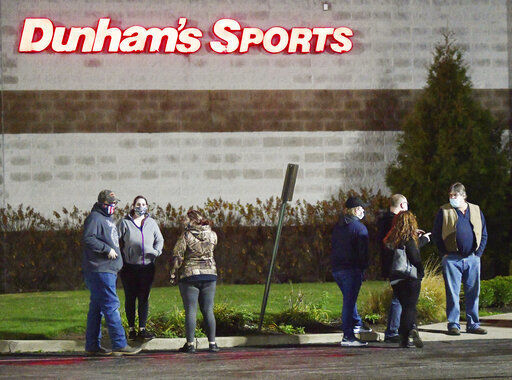 Black Friday early shoppers wait in line to get into Ashtabula Towne Square just before 6 a.m. on Friday, Nov. 27, 2020, in Ashtabula Township, Ohio. (Warren Dillaway/The Star-Beacon via AP) PHOTO CREDIT: Warren Dillaway