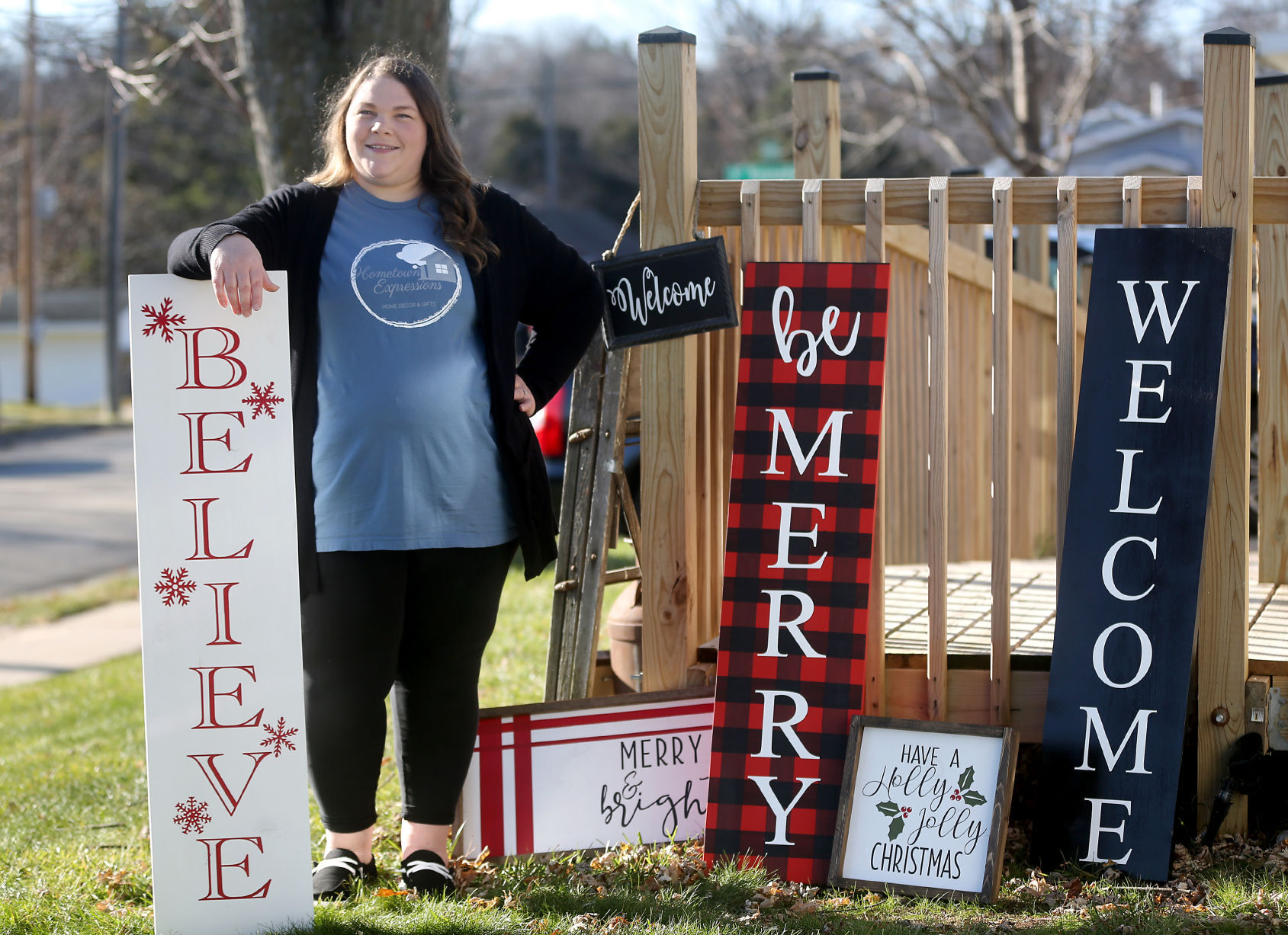 Amy Kempen, owner of Hometown Expressions, shows off some designs outside her home in Dubuque on Friday, Nov. 27, 2020. PHOTO CREDIT: JESSICA REILLY