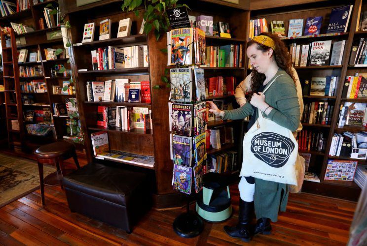 Kelly Burds, of Orange City, Iowa, shops at River Lights Bookstore in Dubuque. PHOTO CREDIT: Nicki Kohl