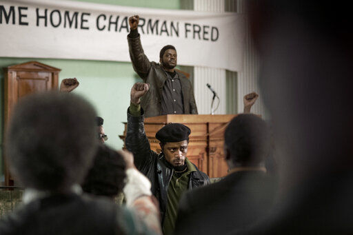 This image released by Warner Bros. Pictures shows LaKeith Stanfield, foreground, and Daniel Kaluuya in a scene from the upcoming film "Judas and the Black Messiah." Warner Bos. Pictures on Thursday announced that all of its 2021 film slate will stream on HBO Max at the same time they play in theaters. (Glen Wilson/Warner Bros. Entertainment via AP) PHOTO CREDIT: Glen Wilson