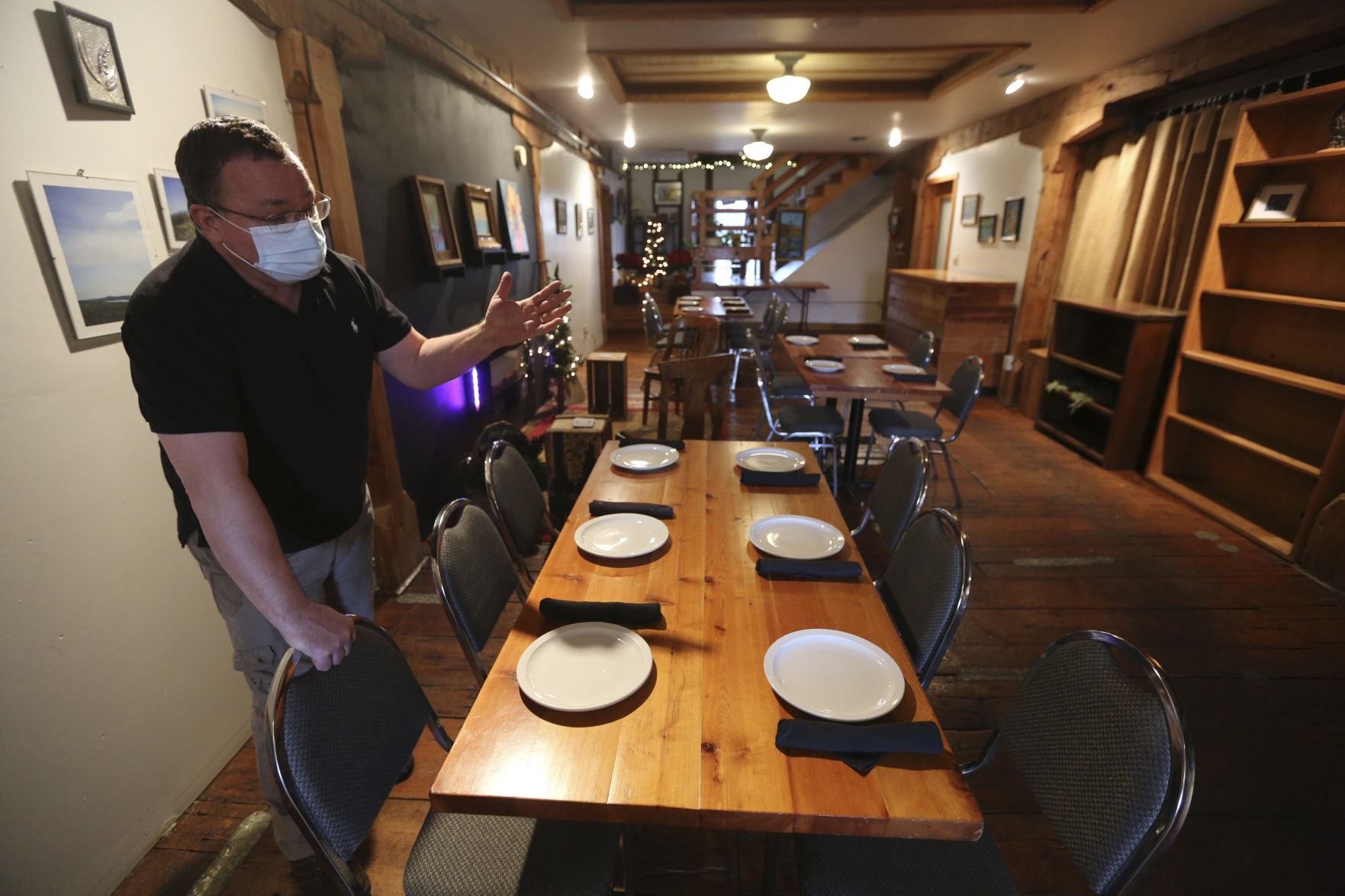Mark Herman, owner and manager of Flatted Fifth Blues & BBQ in Bellevue, Iowa, has created a private dining space on the third floor in response to safety concerns of customers during the COVID-19 pandemic. PHOTO CREDIT: Dave Kettering
